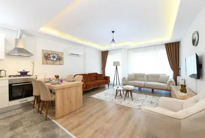 a living room with a couch and a table at Perihan Apartments in Istanbul