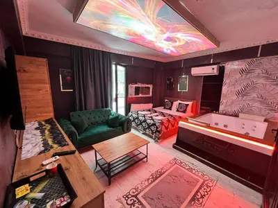 an overhead view of a living room with a couch and a bed at Neo Suit I Hotel in Istanbul