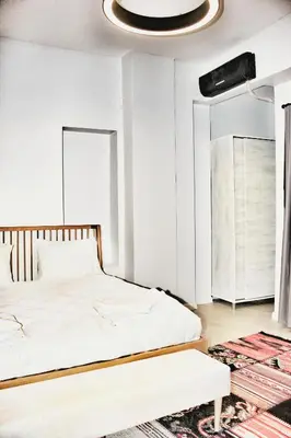 a bedroom with a bed and a ceiling at Million Old City Apartment in Istanbul