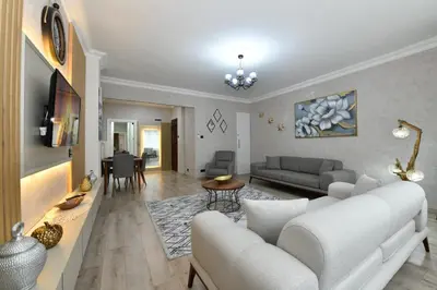 a living room with a couch and a table at VIP Apartment in Istanbul