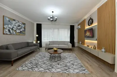 a living room with a couch and a table at VIP Apartment in Istanbul