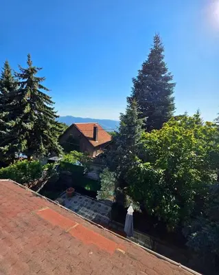 a view of a house from the roof of a yard at Uludag Tatil Evleri & Villa Dogus Uludağ in Bursa