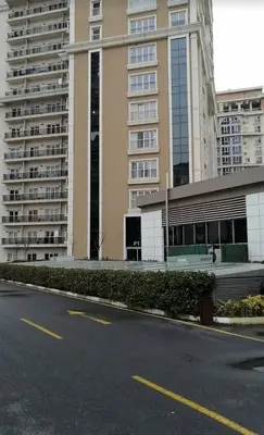 an empty street in front of a large building at ميدوكليه بشاك شهير 1 in Istanbul