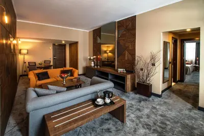 a living room with a couch and a table at Ağaoğlu My Mountain in Uludag