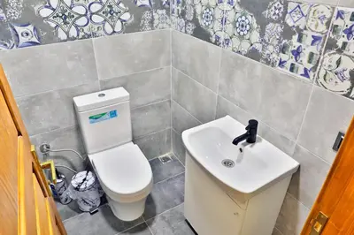a bathroom with a white toilet and a sink at Lal Hayal Konakları in Sapanca