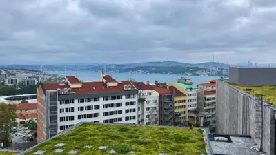 a view of a city with buildings and a body of water at Luxury Unit with Sea View Taksim Square in Istanbul