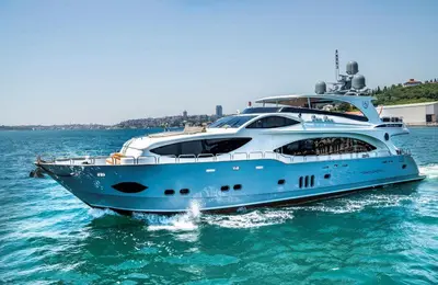 a blue and white yacht in the water at Albaker Tour VIP Yacht in Istanbul