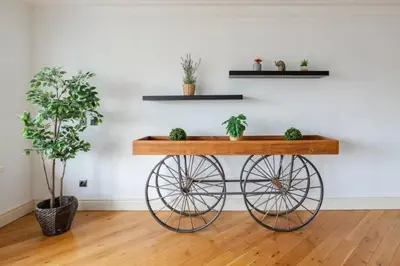 a wooden table with cactuses on it in a room with plants at Luxury Modern 3Bed25Bath Central Bright Pad #375 in Istanbul