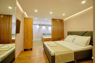 a bedroom with a bed and a large window at Private Apartment at Beylikdüzü nearly to E5 2 in Beylikduzu