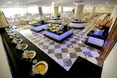 a restaurant with a checkered floor with a checkerboard at Elite Hotels Darica Spa & Convention Center in Gebze