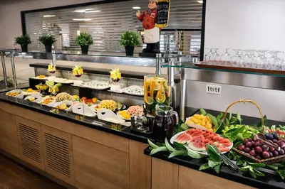 a buffet line with many different types of food at Riva Hotel Taksim in Istanbul
