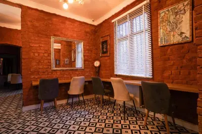 a dining room with a table and chairs at White Bolshoi Rooms in Istanbul