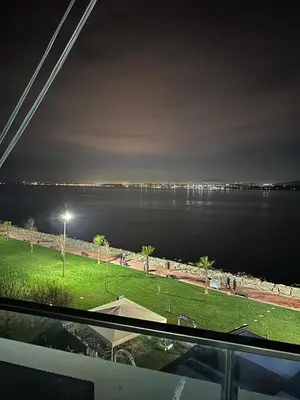 a view of a large body of water at night at Brave otel in Darıca