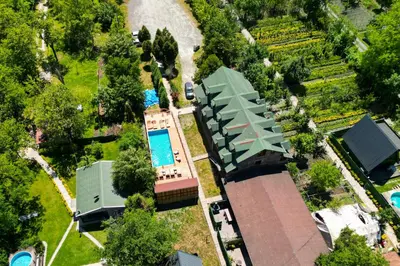 an overhead view of a house with a swimming pool at Meca Deluxe Otel Sapanca in Sapanca