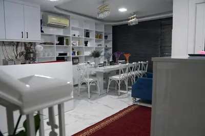 a kitchen and dining room with a table and chairs at Eclipse Hotel in Istanbul