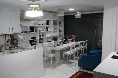 a kitchen and dining room with a table and chairs at Eclipse Hotel in Istanbul