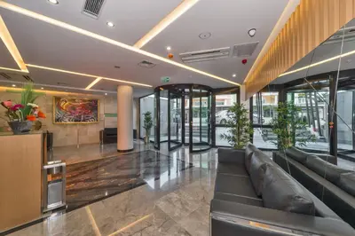 a lobby with a couch in a building at Hotel Boursier 1 & Spa in Istanbul