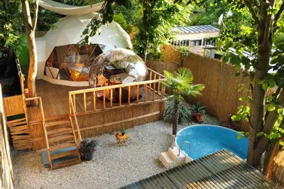 a small backyard with a bed and a tent at Rcsapanca in Sapanca