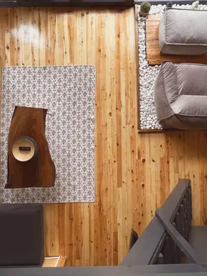an aerial view of a living room with wood floors at Wolf house in Sapanca