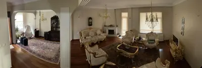 a living room with a couch and a fireplace at fuar VİLLA in Beylikduzu