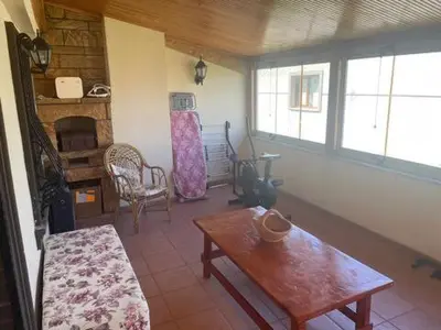 a living room with a table and a fireplace at fuar VİLLA in Beylikduzu