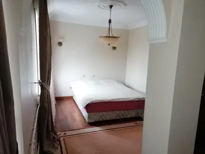 a small bedroom with a bed in a room at fuar VİLLA in Beylikduzu