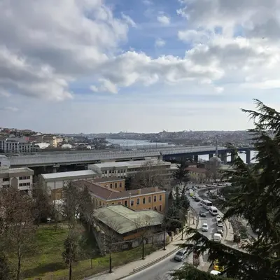 a view of a city with a bridge and a road at Haliç Konaklama in Istanbul