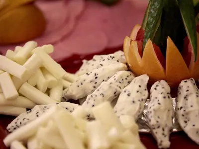 a pile of cheese and crackers on a table at Marmara Place Old City Hotel in Istanbul
