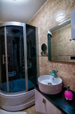 a bathroom with a sink and a shower at AG Hotel & Residence Şişli in Istanbul