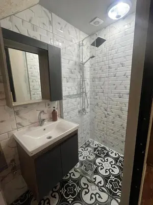 a bathroom with a sink and a shower at Müstakil bina in Istanbul