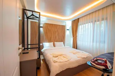 a bedroom with a bed with a red car on it at Mar Residence in Istanbul