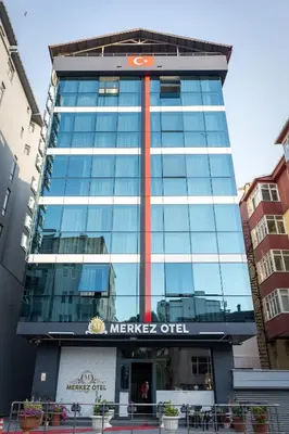 a building with a mercedes oil sign on it at Merkez Otel in Cerkezkoy