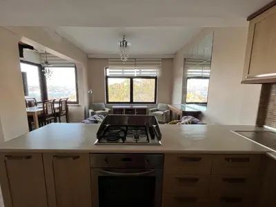 a kitchen with a stove top oven in a room at Heavenly Peace Stunning View Terrace Jacuzzi in Istanbul