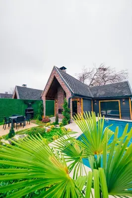 a house with a pool in front of it at Varuna Bungalov Evleri in Sapanca