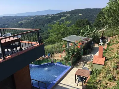 a house with a swimming pool on a balcony at Nerry's Garden İzmit - Camellia in Izmit