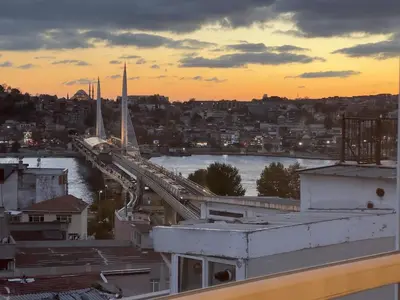 a view of a bridge over a river at sunset at Stunning 2BR 2Bath near Metro - YM 1 in Istanbul