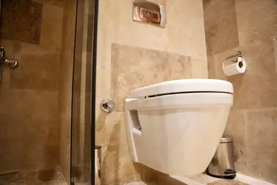 a bathroom with a toilet and a shower at Khalkedon Suites in Istanbul