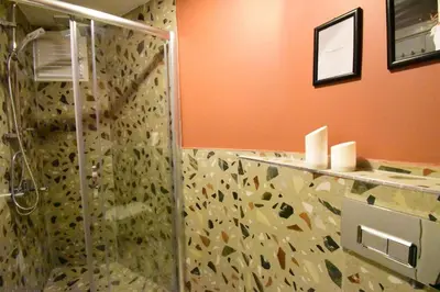 a bathroom with a shower with a glass shower stall at Stunning Seaview 2BR near Metro - YM4 in Istanbul