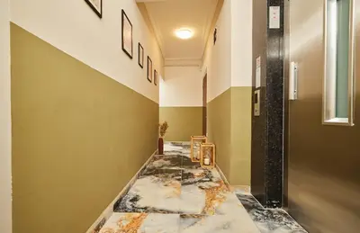 a hallway with a marble floor in a building at Stunning 3BR 3Bathroom 3AC near Metro D2 in Istanbul