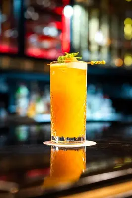 a drink sitting on top of a bar at Delta Hotels by Marriott Istanbul Levent in Istanbul