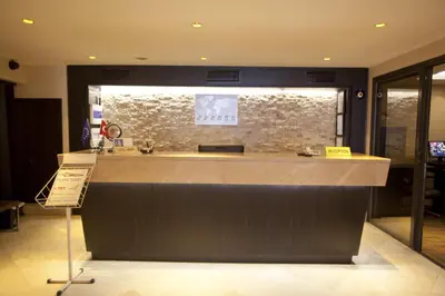 a counter in a store with a sign in front of it at Grand Laleli Hotel in Istanbul