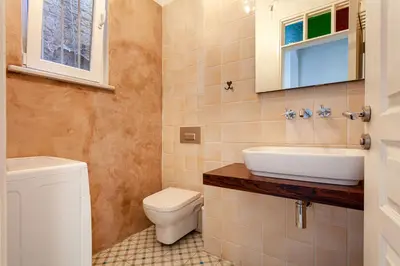 a bathroom with a sink and a toilet at Beautiful restored historical apartment in Galata in Istanbul