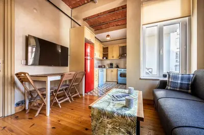a living room with a couch and a table at Classic Historical Galata Apartment in Istanbul
