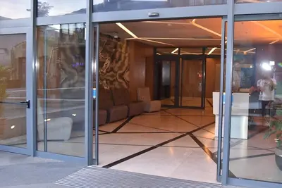 an entrance to a building with glass doors at Sedef Suite in Istanbul