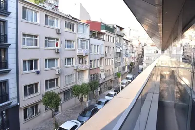 a view of a city street with parked cars and buildings at Sedef Suite in Istanbul