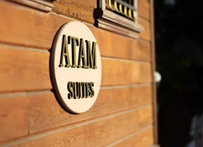 a sign on the side of a building at Atam Suites in Istanbul