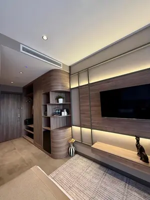a living room with a large flat screen tv at Cityloft 147 in Istanbul