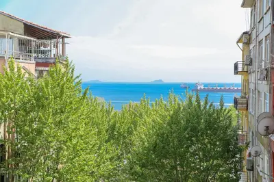 a view of the ocean from between buildings at ASİTANE life HOTEL in Istanbul