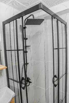 a shower in a bathroom with a glass door at ASİTANE life HOTEL in Istanbul