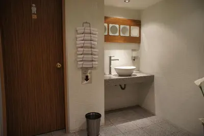 a bathroom with a sink and a toilet in it at My Dora Hotel in Istanbul